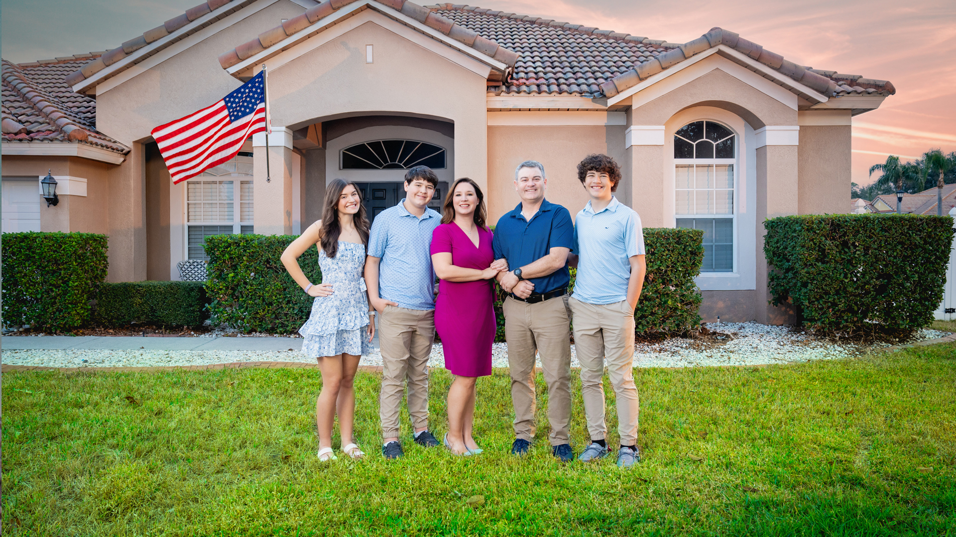 Erin Huntley with her husband and three children outside their Central Florida home